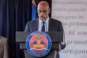 Henry se aferra a la jefatura de gobierno en haití ante la oposición